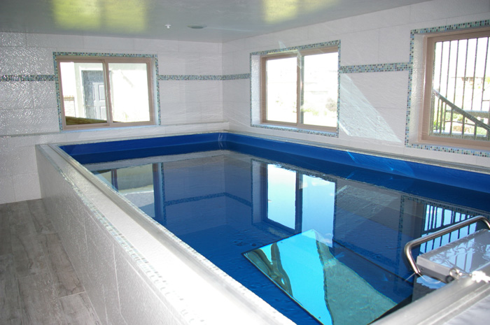 an indoor Endless Pools swimming machine